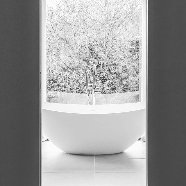 Designer stone bath in window