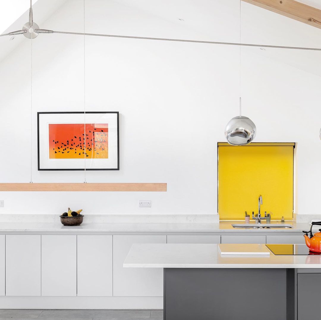 Bright white kitchen with colourful accents