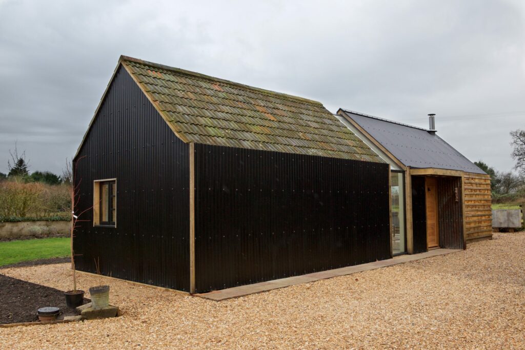 External metal clad rural outbuilding conversion