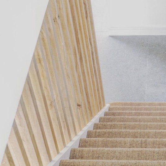 stairs with wooden balustrade