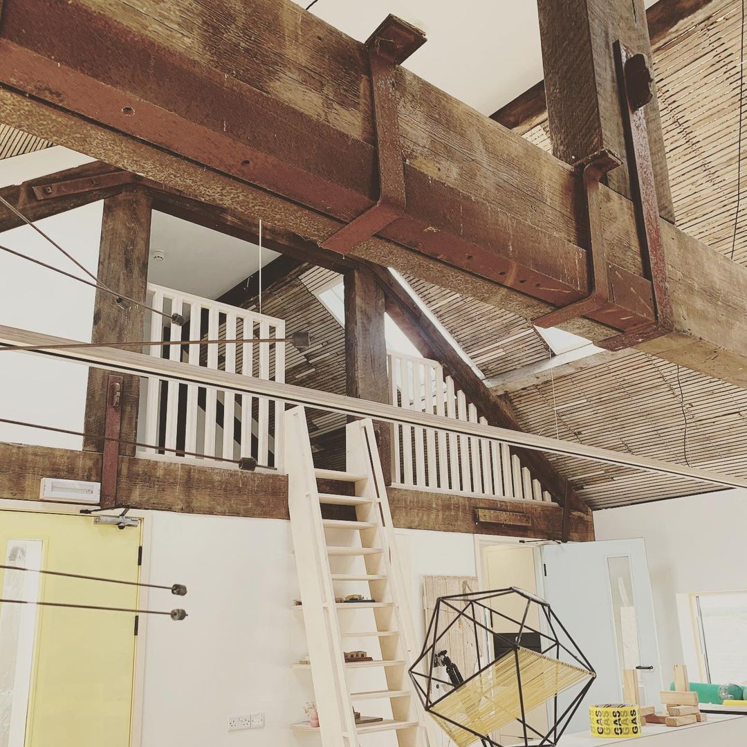 exposed beams and mezzanine office space