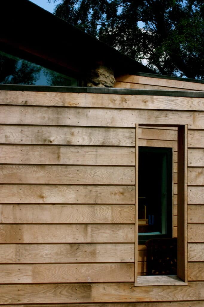 wooden cladding screen with opening