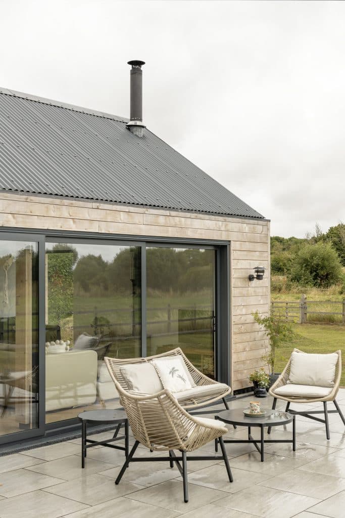 Artel31 - Willowbank Byre - Malmesbury Wiltshire renovation cladding sinusoidal roof patio extension